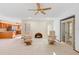 Warm living room showcases a brick fireplace and comfortable seating at 2018 N Normandy Blvd, Deltona, FL 32725