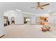 Expansive living room with vaulted ceiling, open layout and natural light at 2018 N Normandy Blvd, Deltona, FL 32725