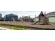 Community playground featuring wooden structures and a variety of fun activities for children at 2025 Forage Dr, Kissimmee, FL 34746