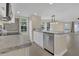 Modern kitchen with stainless steel appliances and bar seating area at 2040 Royal Bay Blvd # 31, Kissimmee, FL 34746