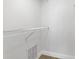 A simple walk-in closet with shelving ready to be used at 2040 Royal Bay Blvd # 31, Kissimmee, FL 34746