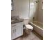 Bathroom featuring a vanity with granite countertops and shower-tub combo at 2408 Swailes Dr # 6, Orlando, FL 32837
