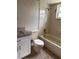 Bathroom featuring a vanity with granite countertops and shower-tub combo at 2408 Swailes Dr # 6, Orlando, FL 32837