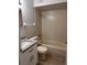 Cozy bathroom features granite vanity and a shower-tub with tiled walls at 2408 Swailes Dr # 6, Orlando, FL 32837