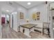 Comfortable kitchen nook with bench seating, dining table and wood floors at 2418 W 1St St, Sanford, FL 32771