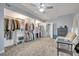 Spacious walk-in closet with custom shelving, storage solutions, and natural light at 2418 W 1St St, Sanford, FL 32771