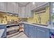 This kitchen features ample storage, modern appliances and bright countertops at 2418 W 1St St, Sanford, FL 32771