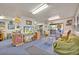 Open floor plan living room with bright lighting, carpet and access to an outdoor deck at 2418 W 1St St, Sanford, FL 32771