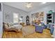 Comfortable living room featuring hardwood floors and ample natural light at 2418 W 1St St, Sanford, FL 32771