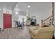 Bright living room features a decorative fireplace, hardwood floors, and comfortable seating at 2418 W 1St St, Sanford, FL 32771