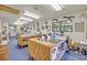 Bright studio with ample workspace, natural light from stained glass windows, and abundant storage at 2418 W 1St St, Sanford, FL 32771