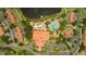 Aerial view showcasing the community layout with pools, buildings, and landscaping at 3019 White Orchid Rd, Kissimmee, FL 34747