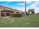 Lush backyard with patios, perfect for relaxing and entertaining outdoors at 3019 White Orchid Rd, Kissimmee, FL 34747