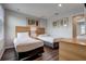Bedroom with 2 twin beds, wood look floors, and a dresser at 3019 White Orchid Rd, Kissimmee, FL 34747