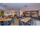 Upscale clubhouse bar area with tables, chairs, and a pool table at 3019 White Orchid Rd, Kissimmee, FL 34747