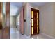 Bright foyer showcasing a decorative front door and a glimpse into the living area at 3121 Thistlehill Drive, Winter Park, FL 32792