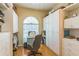 Spacious closet features built-in shelving, drawers, and hanging rods, providing ample storage at 34239 Woodridge Ln, Eustis, FL 32736