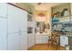 This is a huge walk in closet with built in cabinets and shelves at 34239 Woodridge Ln, Eustis, FL 32736