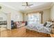 Spacious main bedroom featuring access to the backyard at 34239 Woodridge Ln, Eustis, FL 32736