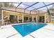 A well-maintained pool in the backyard offers a refreshing outdoor space for relaxation and enjoyment at 34239 Woodridge Ln, Eustis, FL 32736