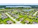 This aerial shows a beautiful community with large lawns, ponds, and well-maintained homes, enhancing the neighborhood appeal at 3630 Trimaran Dr, Orlando, FL 32820