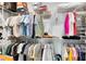 Spacious walk-in closet with an array of shelving providing lots of storage space at 3630 Trimaran Dr, Orlando, FL 32820