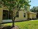 This home boasts a well-maintained exterior with lush landscaping and charming architectural details at 3658 Oakdale Cir # 100, Oviedo, FL 32765