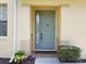 A welcoming front entrance with sidelight window at 3658 Oakdale Cir # 100, Oviedo, FL 32765