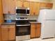 Updated kitchen with stainless steel appliances and ample cabinet space at 3658 Oakdale Cir # 100, Oviedo, FL 32765
