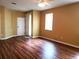 Spacious living area with hardwood floors and neutral wall color at 3658 Oakdale Cir # 100, Oviedo, FL 32765