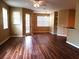 Spacious living room with hardwood floors and natural light at 3658 Oakdale Cir # 100, Oviedo, FL 32765