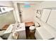 Bathroom featuring linoleum flooring and a toilet next to a drawer at 40431 Country Rd, Eustis, FL 32736