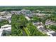 Gorgeous overhead view of a community featuring a winding waterway and verdant trees at 476 Water St, Celebration, FL 34747