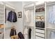 Custom walk-in closet with ample shelving, hanging space, and stylish organization at 476 Water St, Celebration, FL 34747