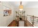Dining room featuring hardwood floors, large table and an oversized decorative clock at 476 Water St, Celebration, FL 34747