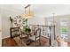 Dining room featuring hardwood floors and a decorative clock at 476 Water St, Celebration, FL 34747