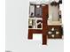 Detailed top-down view of a floorplan showing a modern living area, kitchen, dining room, and bathroom with sleek finishes at 476 Water St, Celebration, FL 34747