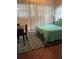 Bedroom with desk, wood floors, and natural light, providing a serene atmosphere at 485 Palm St, Winter Garden, FL 34787