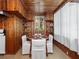 Charming dining area with wood paneling, a round table set for four, and a cozy, inviting atmosphere at 485 Palm St, Winter Garden, FL 34787