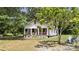 Inviting single Gathering home featuring a cozy front porch perfect for enjoying the outdoors at 485 Palm St, Winter Garden, FL 34787