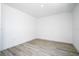 Clean bedroom with modern vinyl flooring, ready for personalization at 509 St. Johns Ct, Poinciana, FL 34759