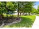 Picturesque Millennium Park with lakeside views, walking paths, and green spaces at 5384 Barton Dr, Orlando, FL 32807