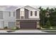 Modern two-story home with a gray color scheme, a two-car garage, and manicured landscaping at 564 Southern Edge Way, Sanford, FL 32771