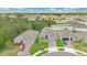 An aerial view showcases the property nestled among lush trees in a desirable neighborhood at 6013 Mount Zion Cir, Deland, FL 32724