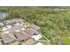 The home is surrounded by lush greenery, backing up to a wooded area for privacy and seclusion at 6013 Mount Zion Cir, Deland, FL 32724