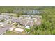 An aerial view of the neighborhood near a lake, highlighting the serene surroundings at 6013 Mount Zion Cir, Deland, FL 32724