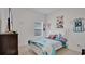 Bright bedroom with a bed, TV, and decor; ideal for a or teenager at 6013 Mount Zion Cir, Deland, FL 32724