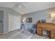 Bedroom with white closet doors and a desk at 612 Golden Dawn, Apopka, FL 32712