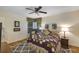 Cozy bedroom with patchwork quilt and patterned rug at 612 Golden Dawn, Apopka, FL 32712
