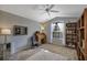 Bedroom features lots of light, hardwood floors, and a bookshelf at 612 Golden Dawn, Apopka, FL 32712